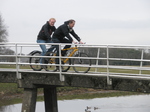 P1011267 Marijn and Pepijn cycling over bridge.JPG